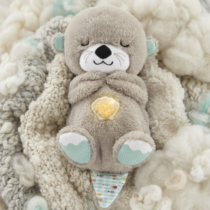 DreamOtter™ – Peluche Respirador con Música Relajante que Duerme a tu Bebé Solo.